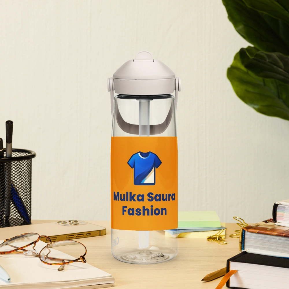 Fashion-branded water bottle on wooden desk.