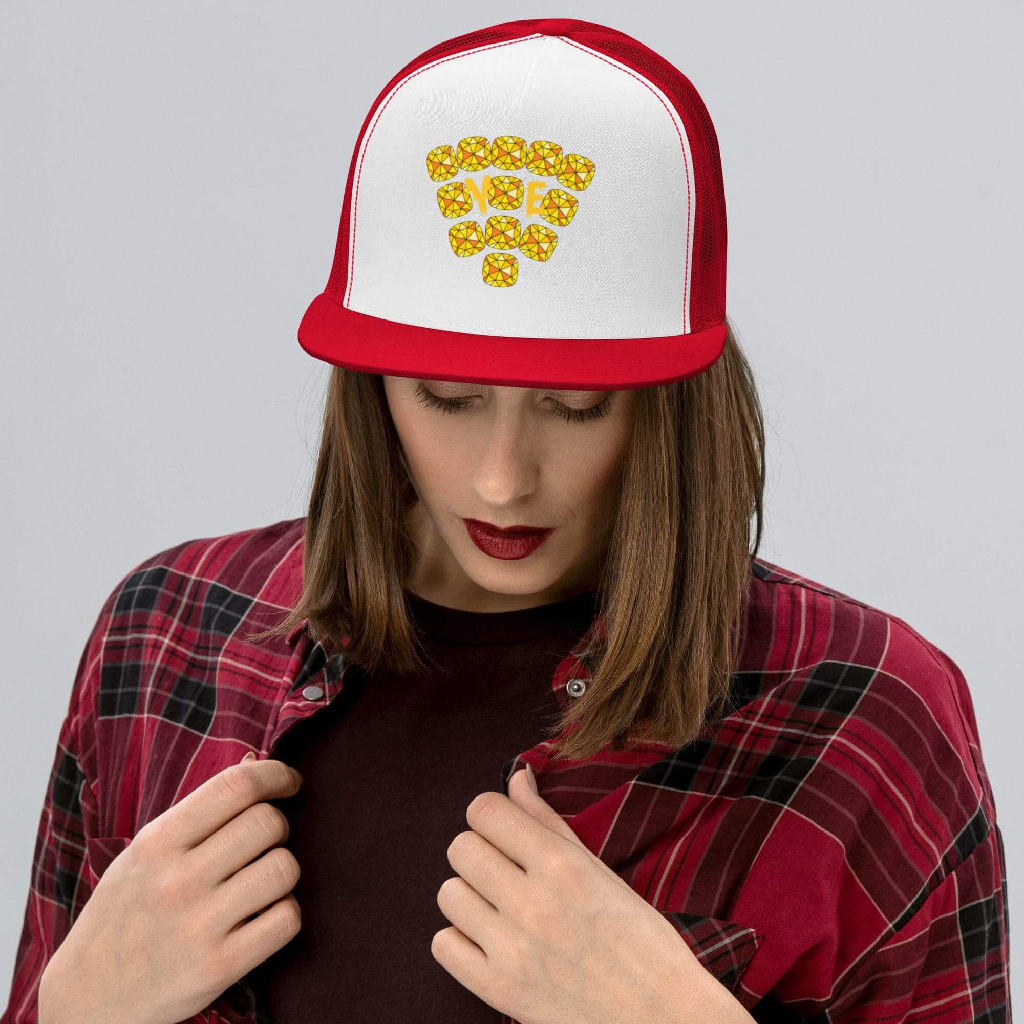 Woman wearing hat with pizza slice design.