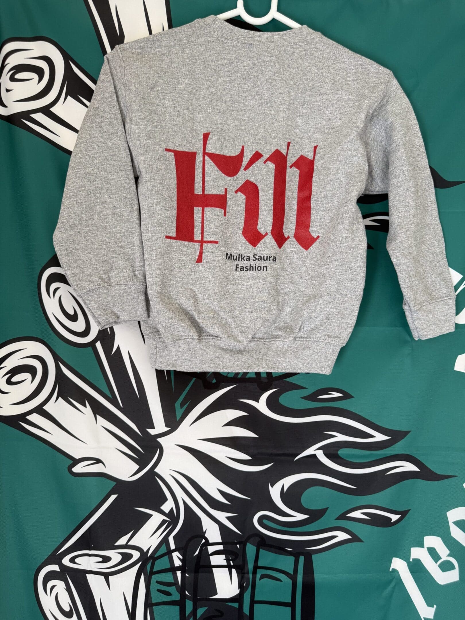 Gray sweatshirt with red text design.