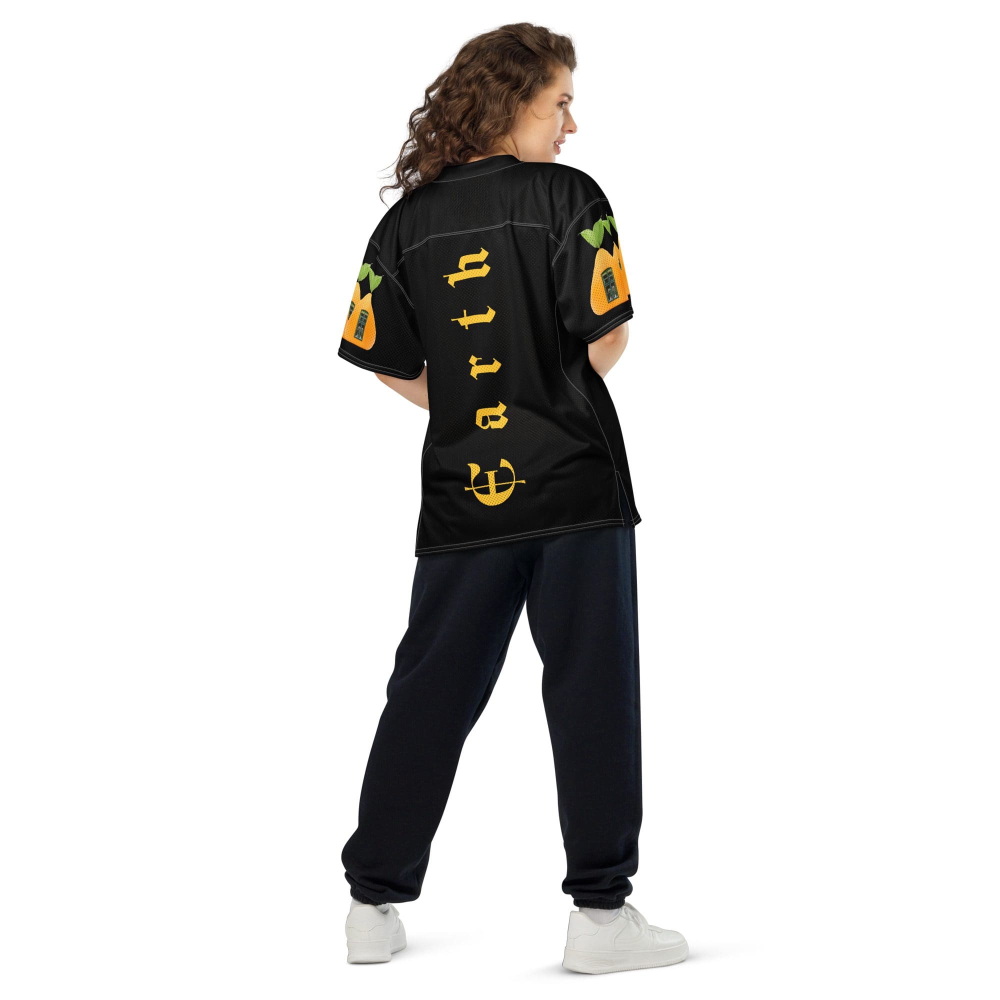 Woman in black sports jersey, casual style.