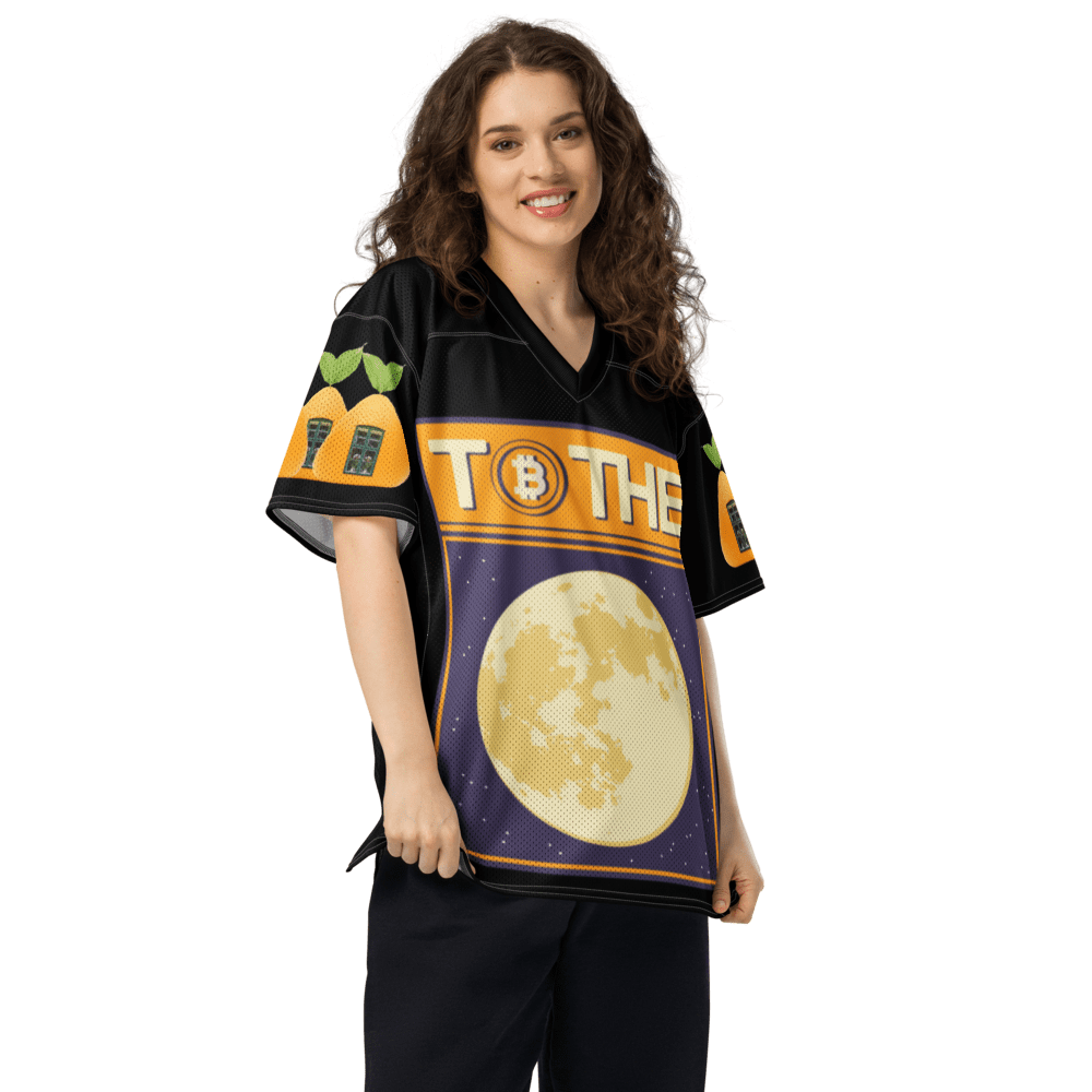 Woman wearing a cryptocurrency-themed shirt.