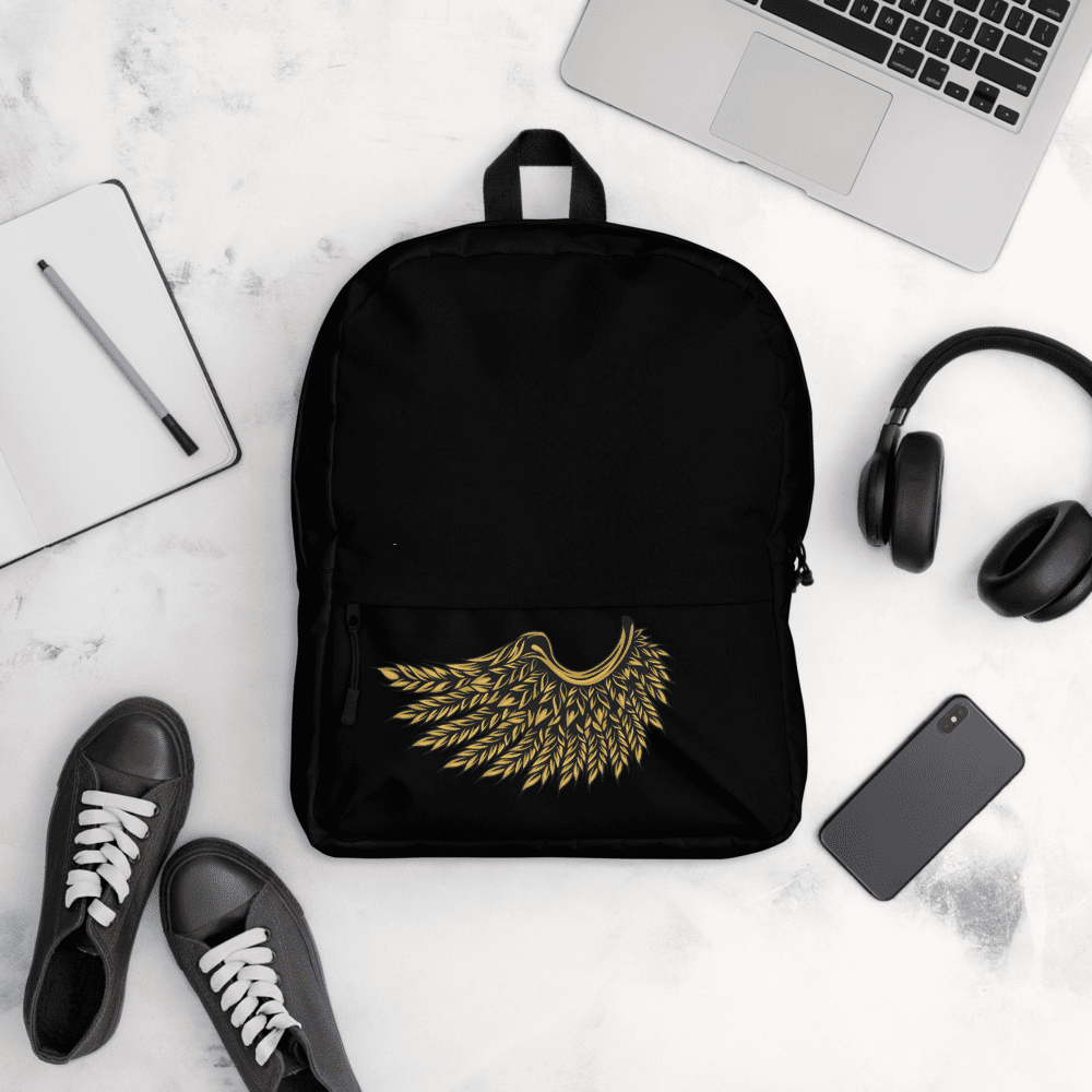 Black backpack with golden wing design.