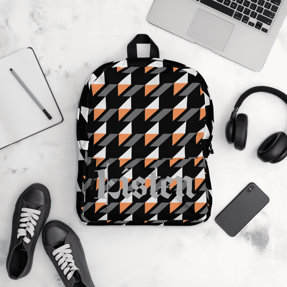 Geometric patterned backpack with accessories around.