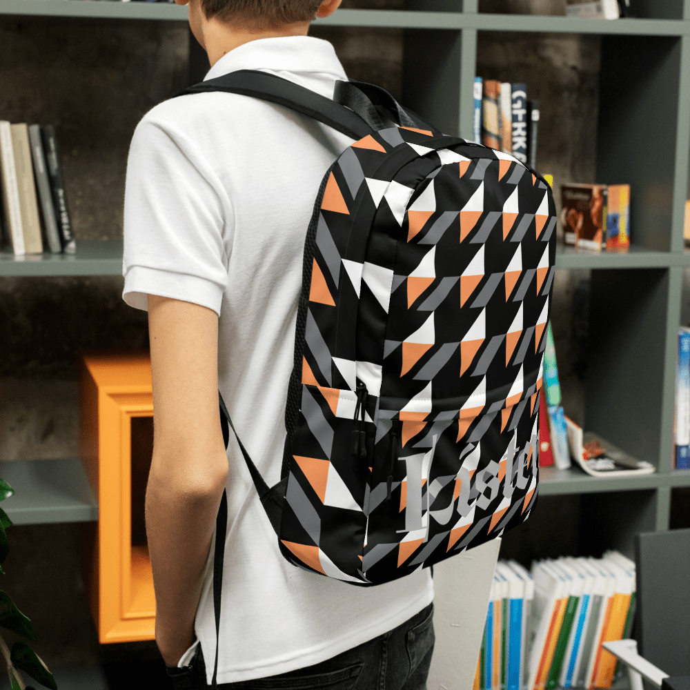Person with geometric backpack in library.