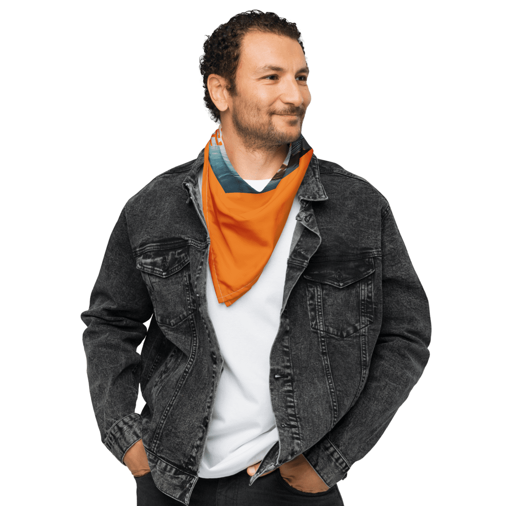 Man in denim jacket and orange scarf.