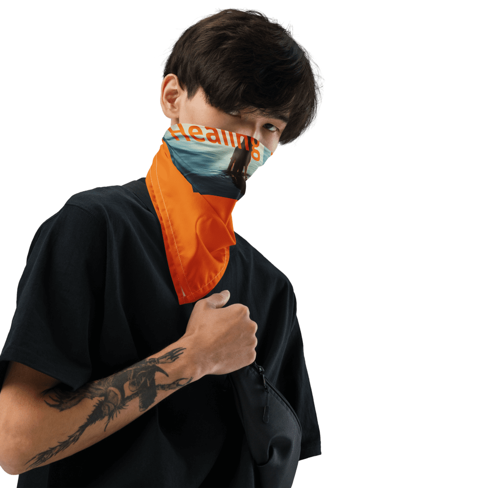 Person wearing orange scarf and black shirt.