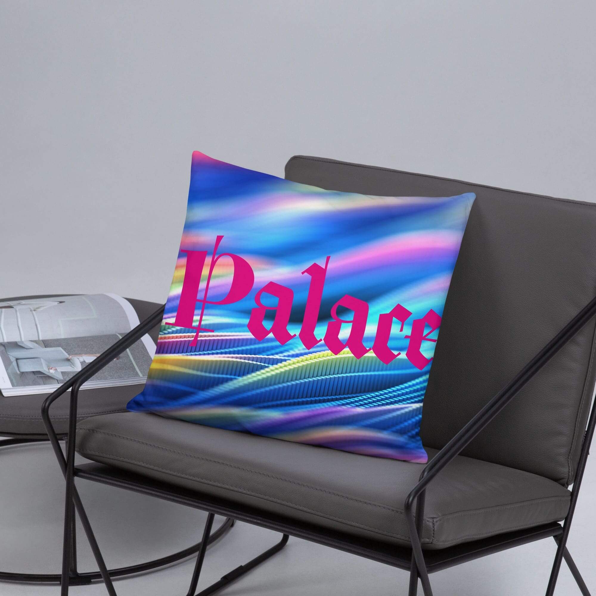 Colorful pillow with "Palace" on a chair.