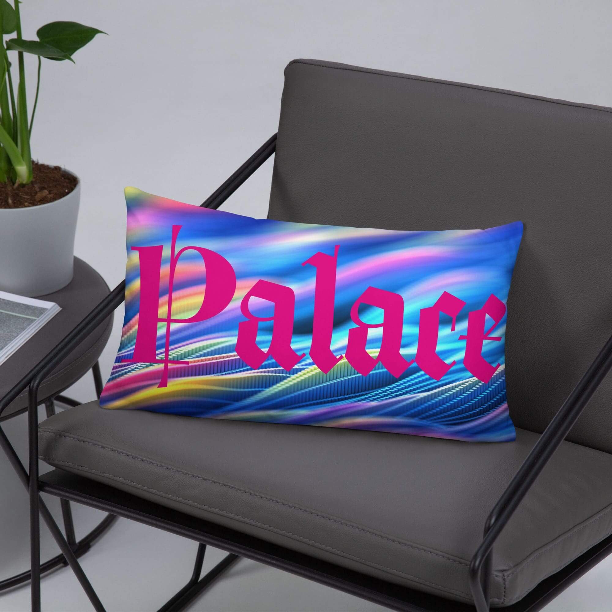 Colorful "Palace" pillow on gray chair.
