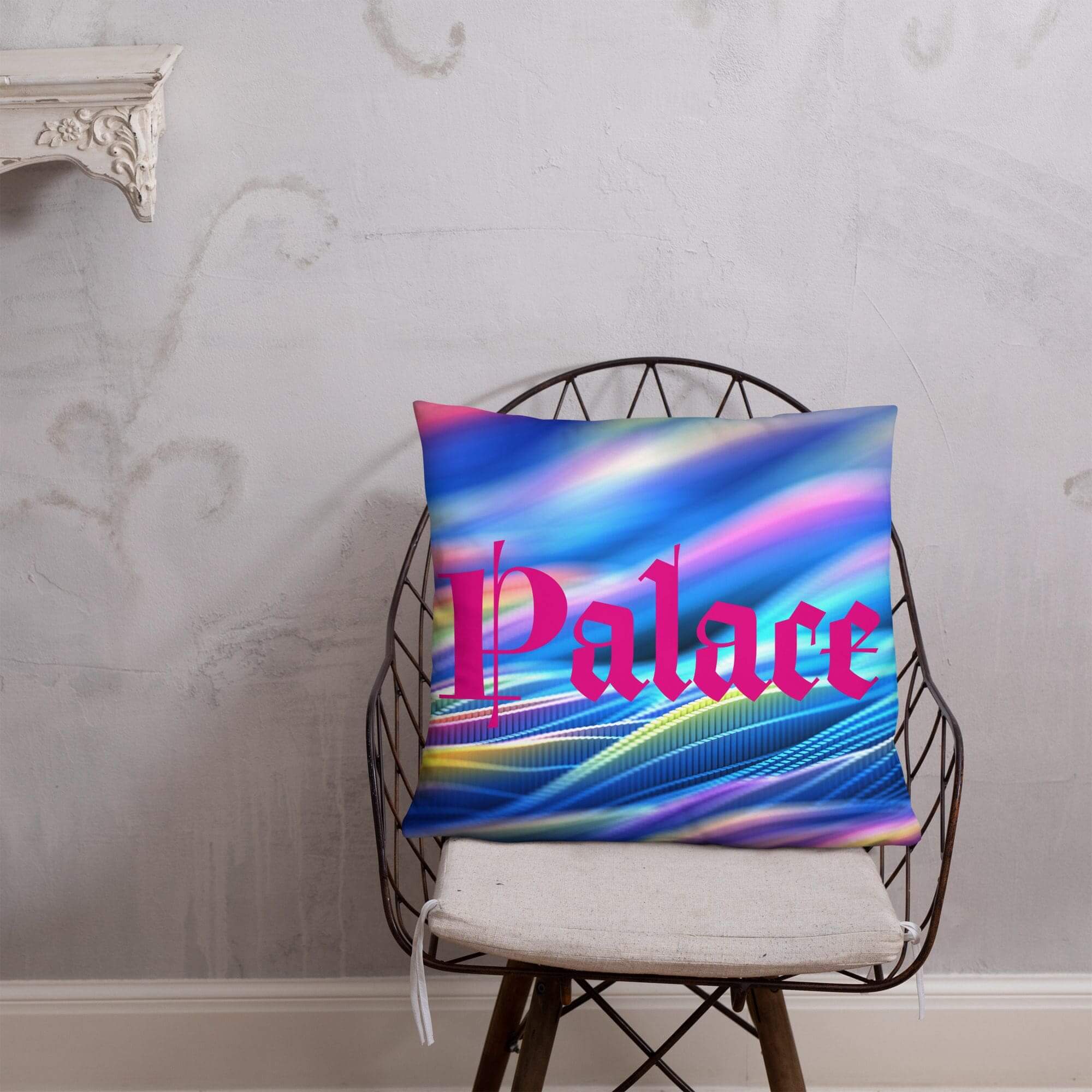 Colorful cushion on chair with "Palace" text.