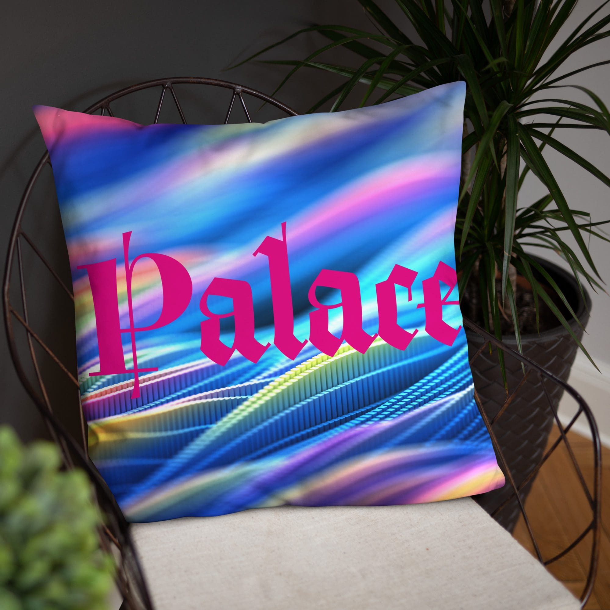 Vibrant swirl pillow with bold "Palace" lettering