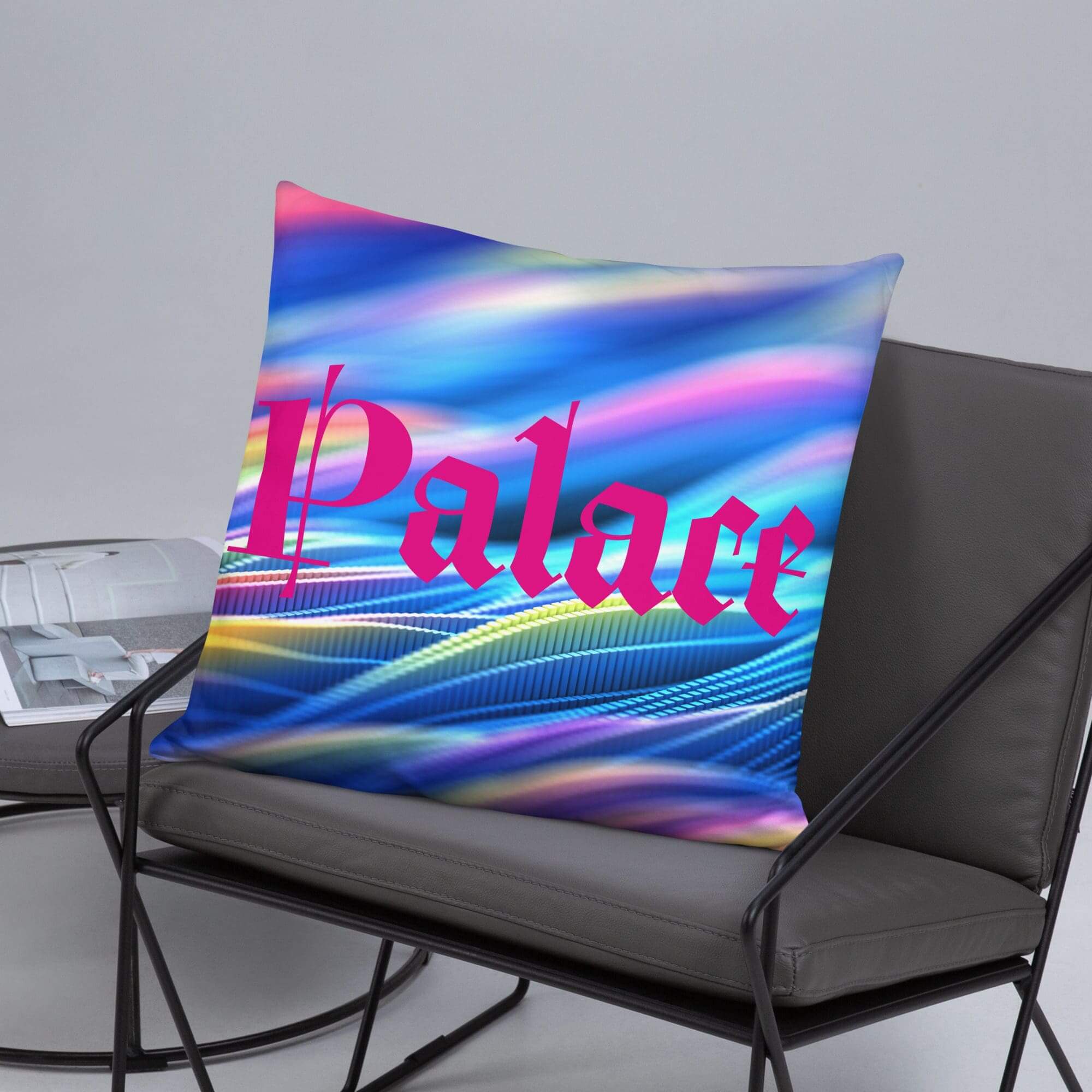 Colorful pillow with "Palace" text on chair.