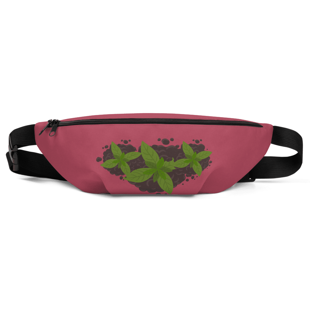 Pink waist bag with green leaf design.