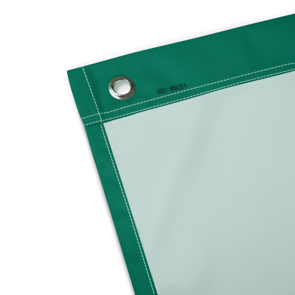 Green and white tarpaulin corner with grommet.