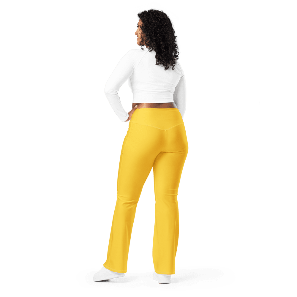 Woman in yellow pants and white top.
