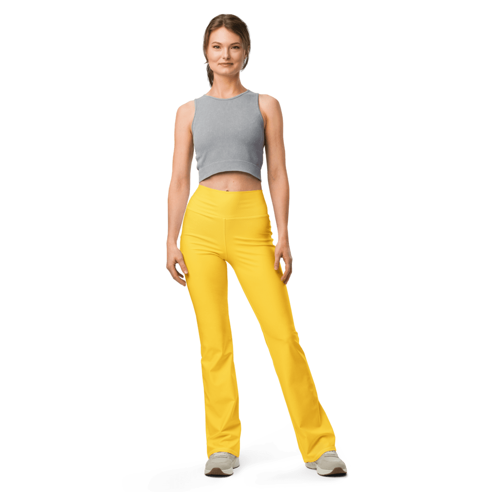 Woman in gray top and yellow pants.