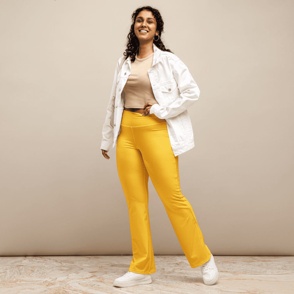 Woman in yellow pants and white jacket.