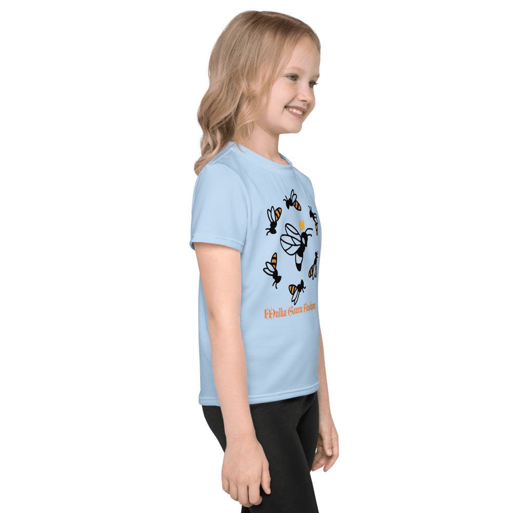 Girl wearing blue bee-themed t-shirt.