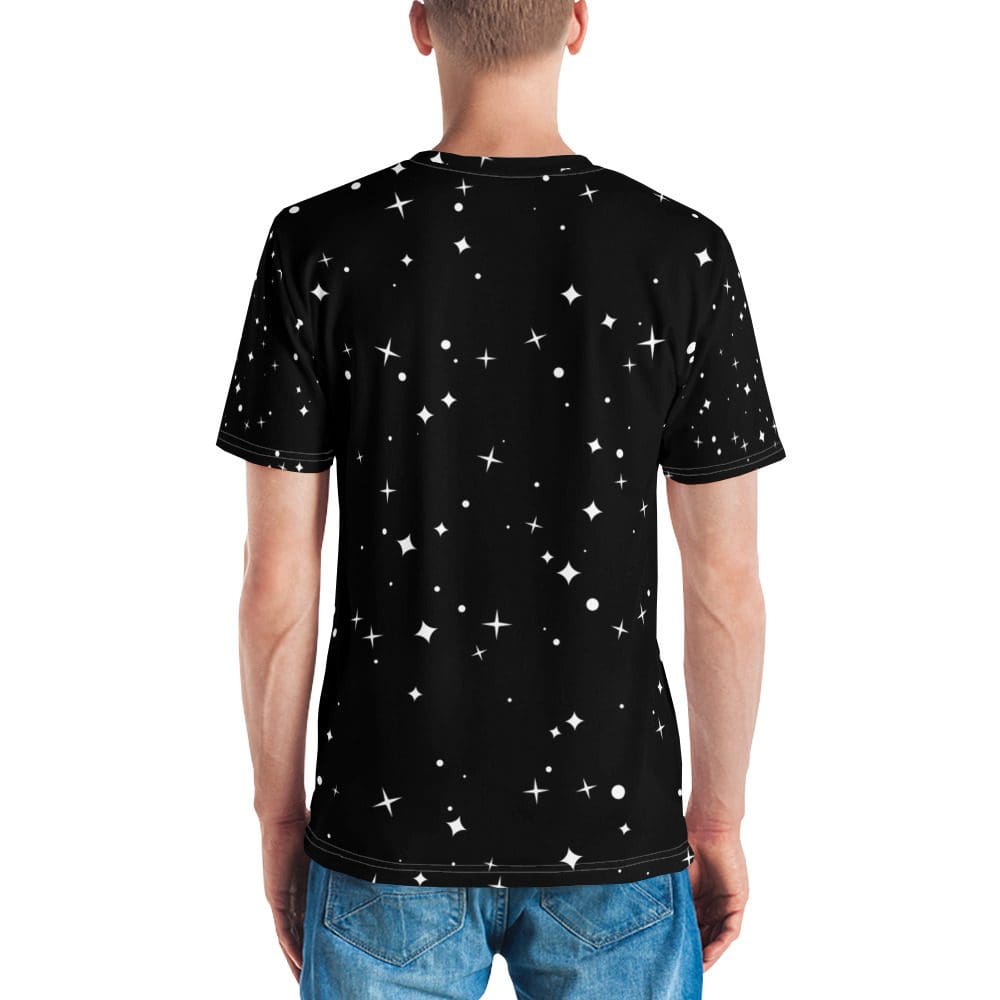 Man wearing starry black t-shirt, blue jeans.