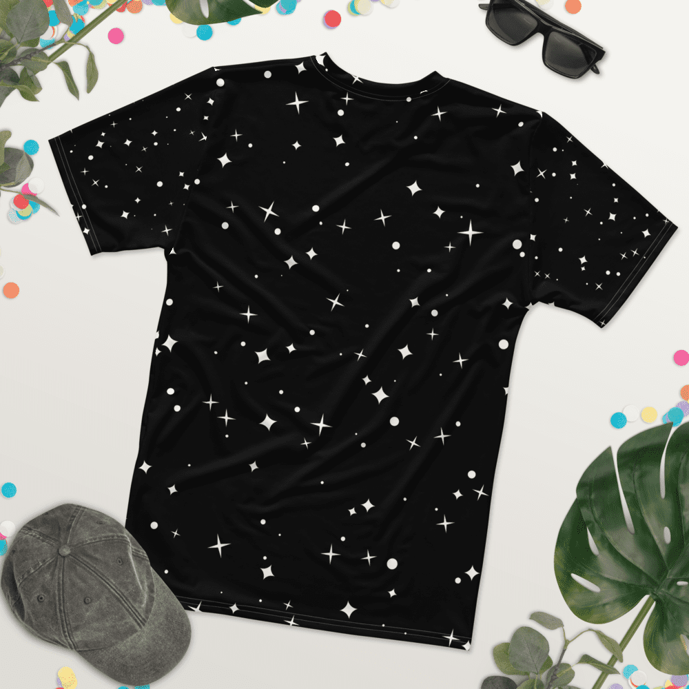 Black star-patterned t-shirt with accessories.