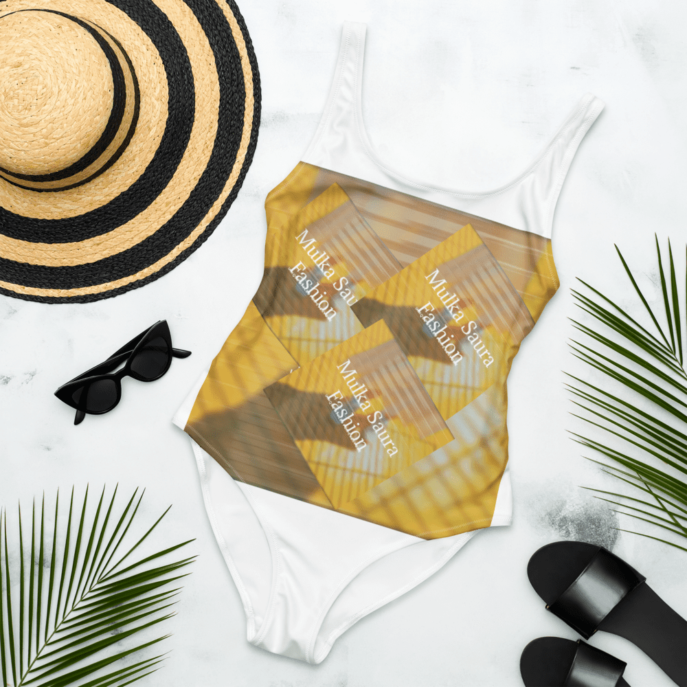 Swimsuit with hat, sunglasses, and sandals.