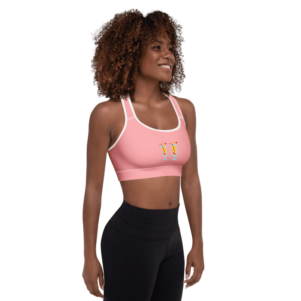 Smiling woman wearing pink sports bra