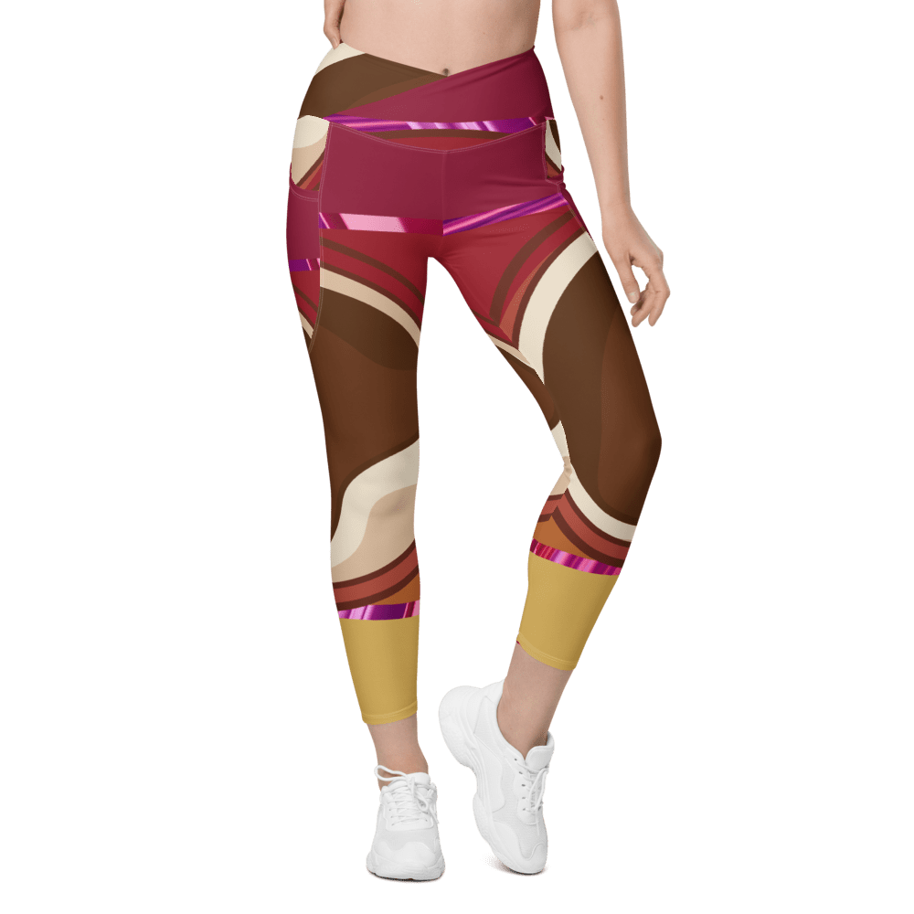 Colorful abstract-patterned leggings on female model.