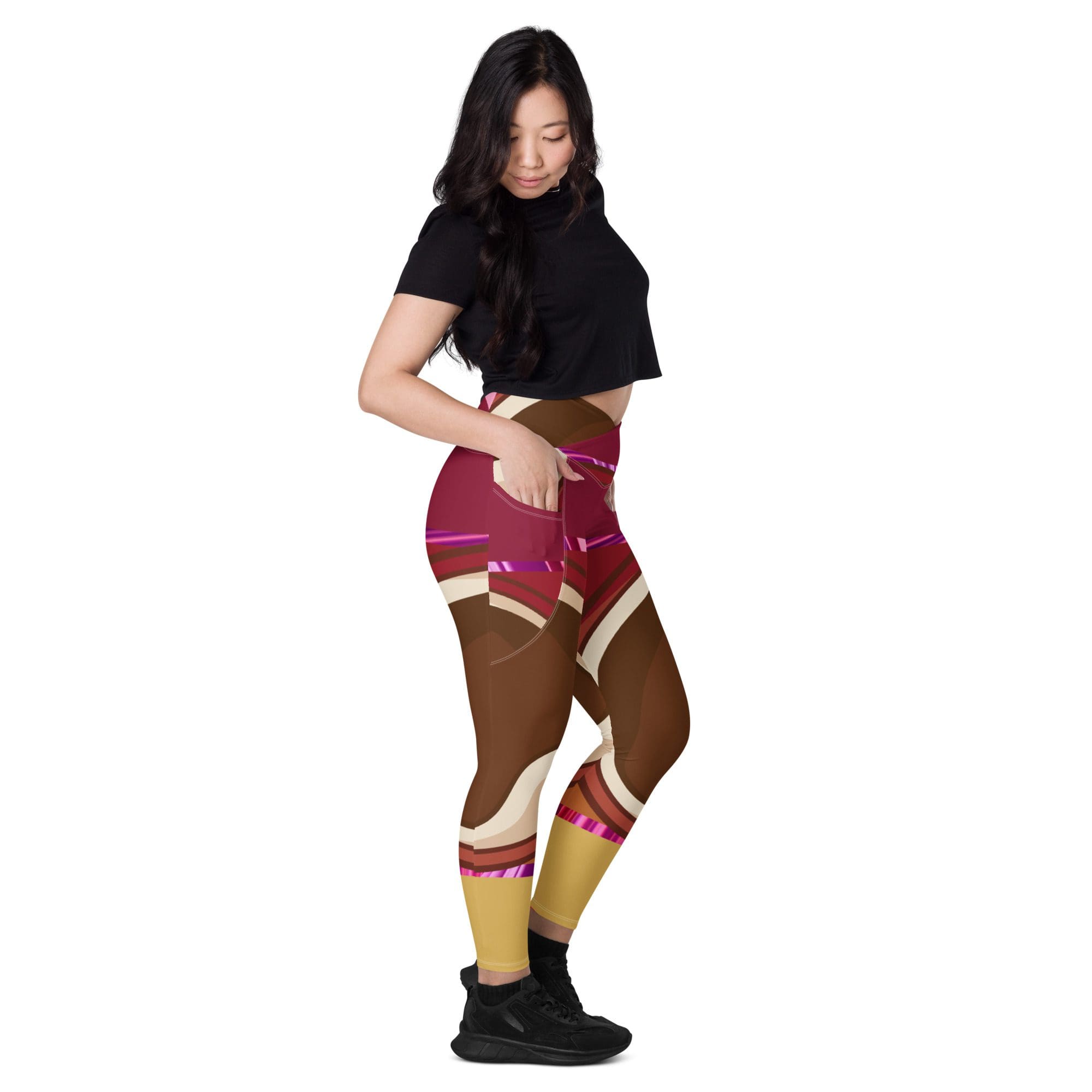 Woman in colorful geometric leggings and crop top