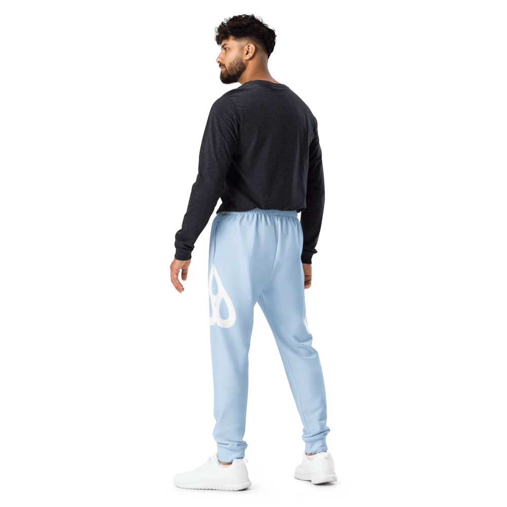 Man wearing black shirt and blue sweatpants.