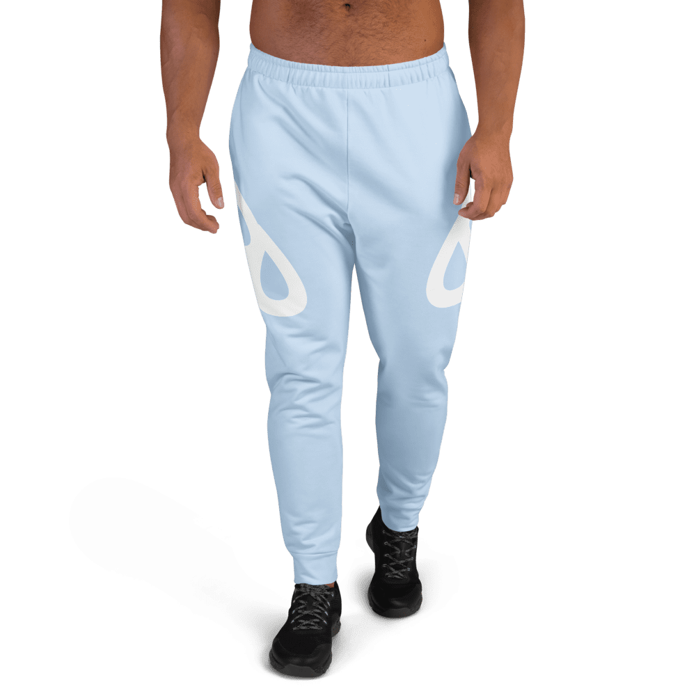 Man wearing light blue joggers, black shoes.