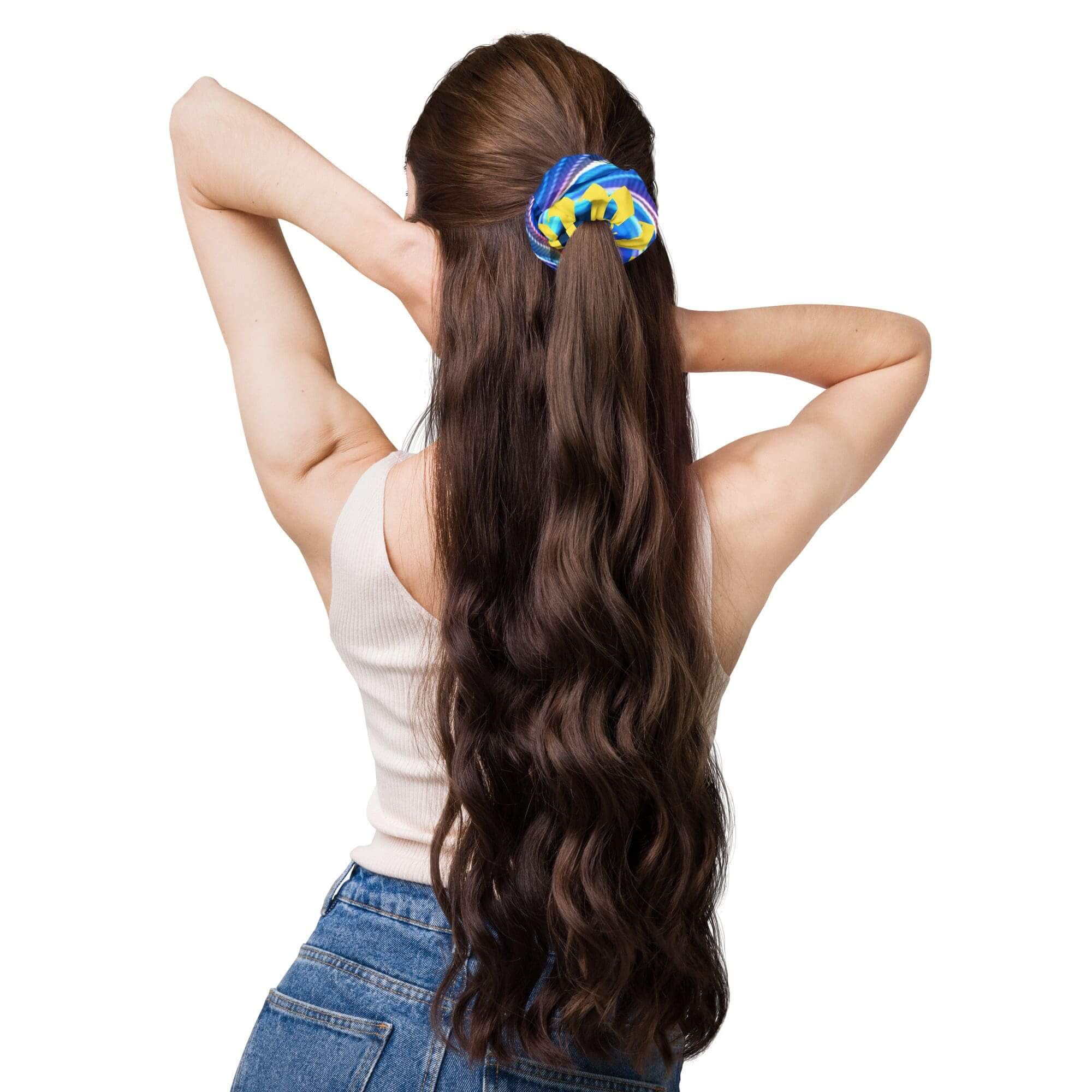 Person with long hair and colorful scrunchie.