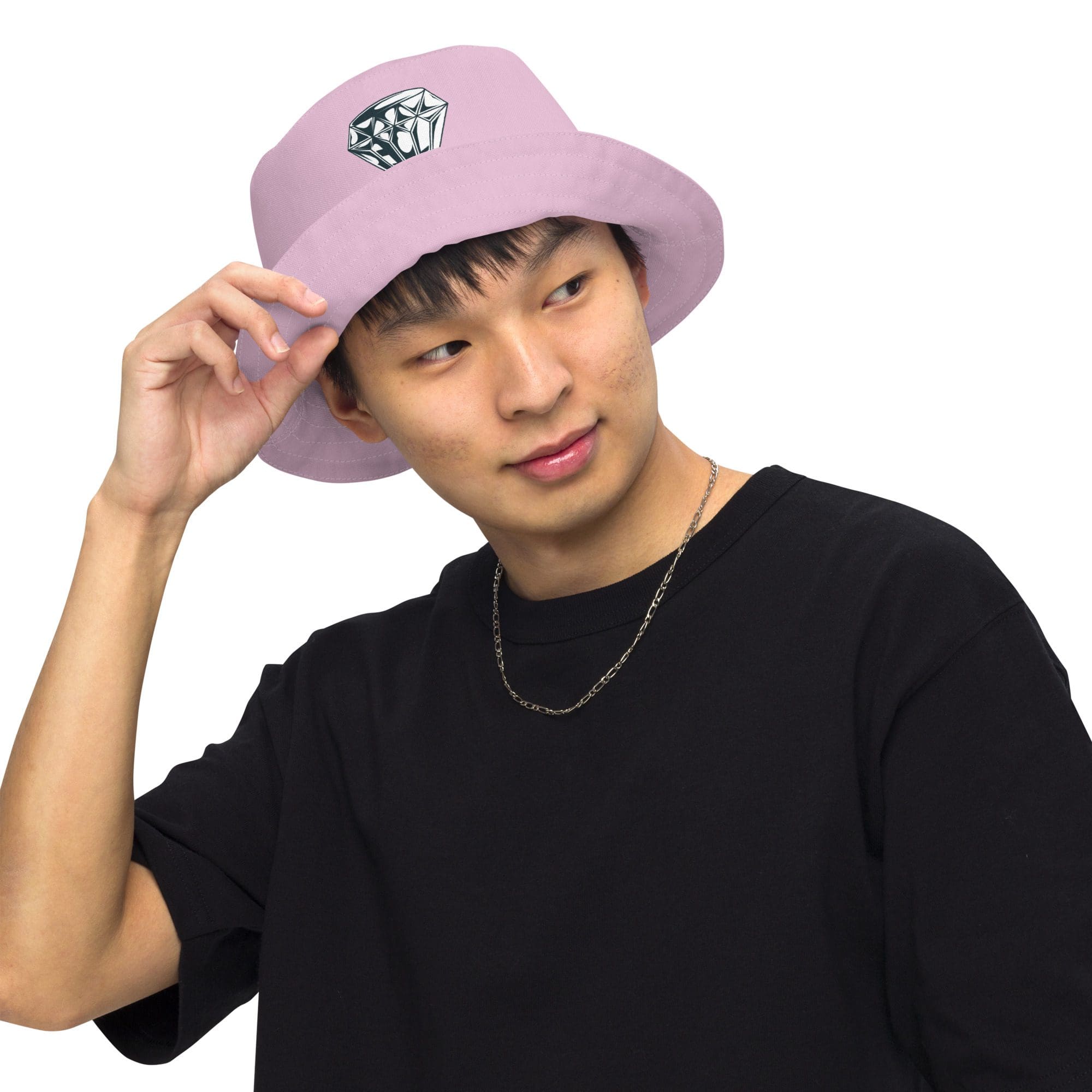 Man wearing pink hat with diamond design.