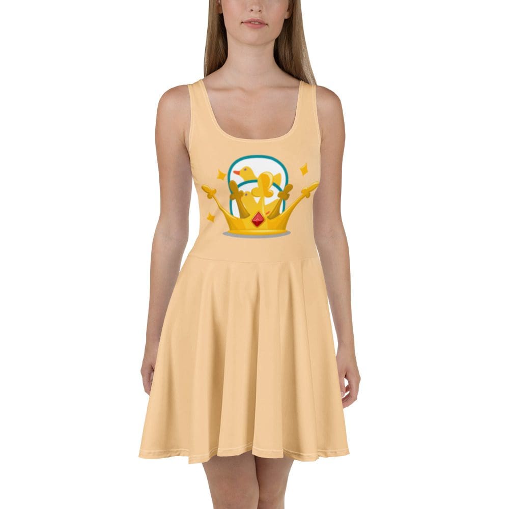 Woman wearing a yellow dress with crown design.
