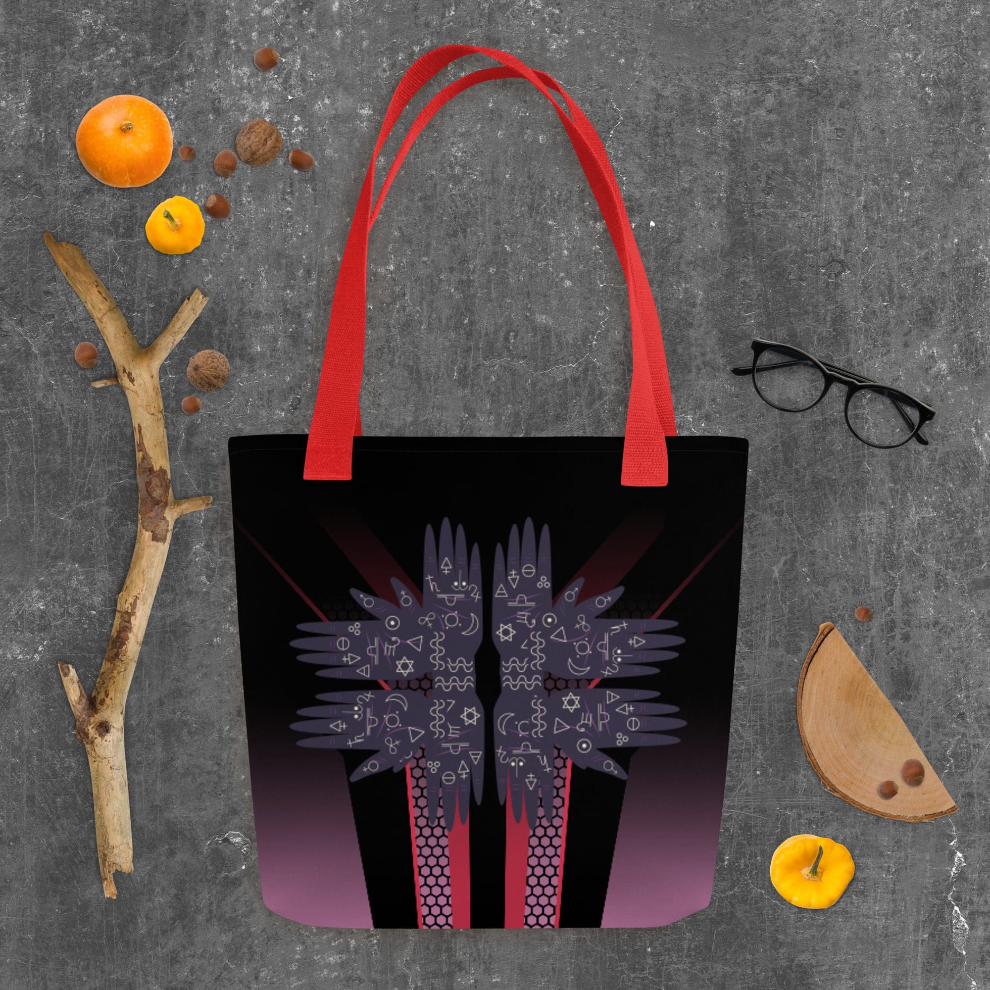 Tote bag with geometric design and objects.
