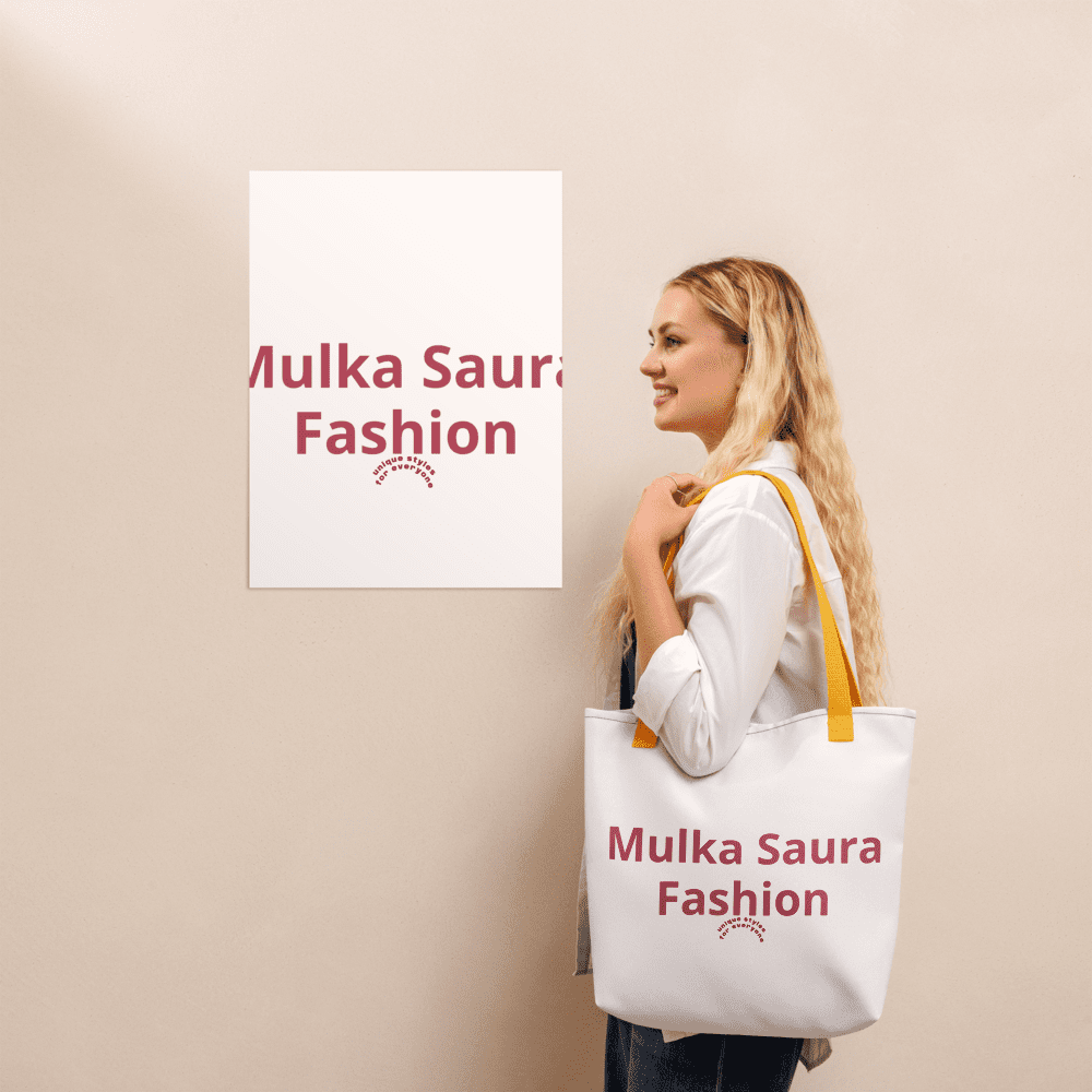 Woman holding Mulka Saura Fashion tote bag.