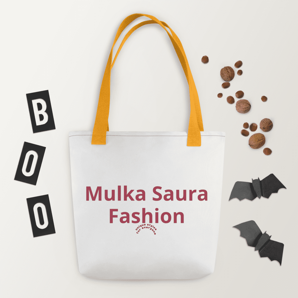 Tote bag with Halloween decorations and text.