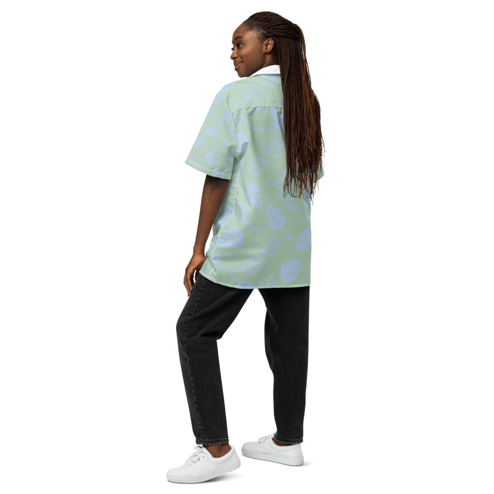 Person in blue shirt and black pants.