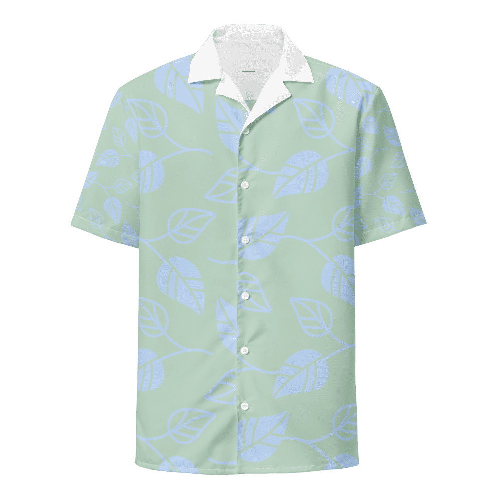 Green leaf-patterned button-up shirt.