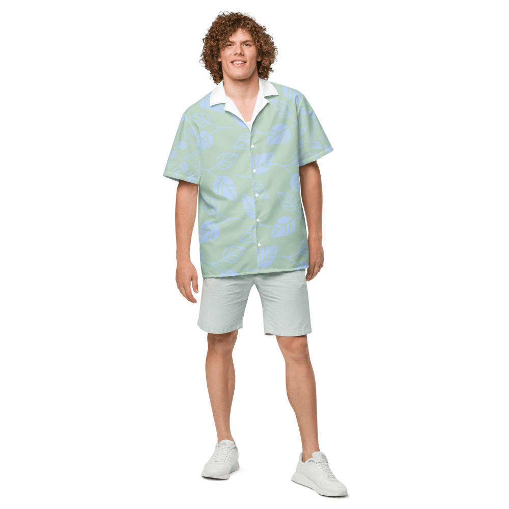 Man wearing green shirt and white shorts.