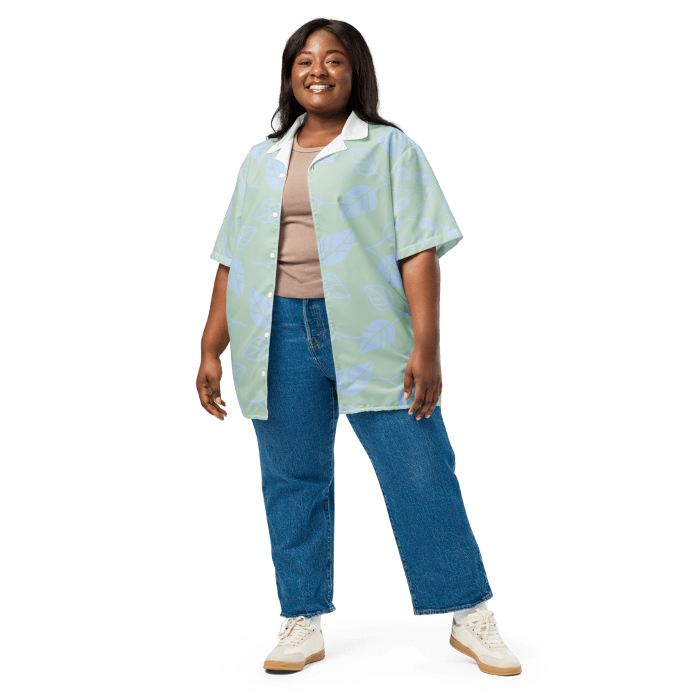 Smiling person in casual denim outfit.