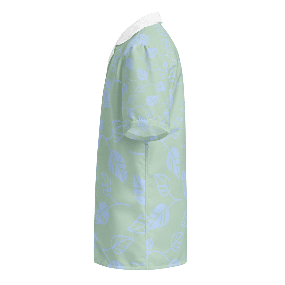 Green leaf-patterned short-sleeve dress side view.