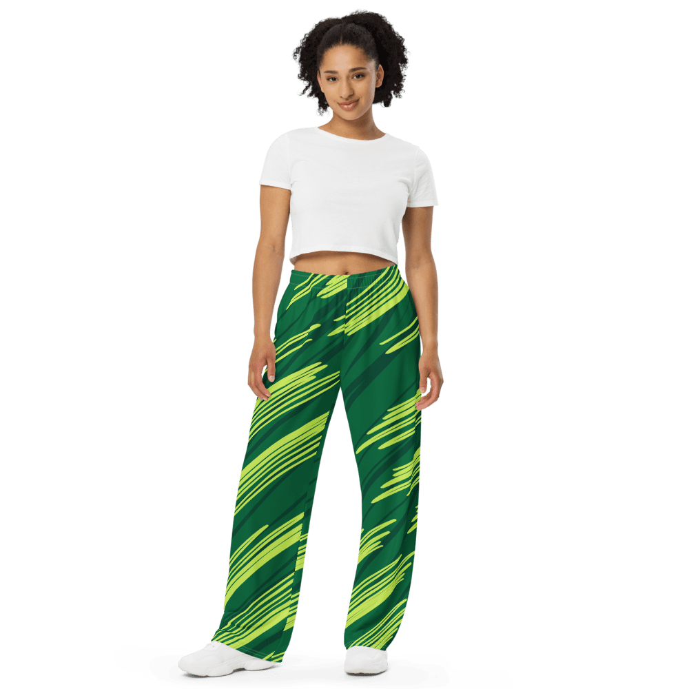 Person wearing green striped pants and white top.