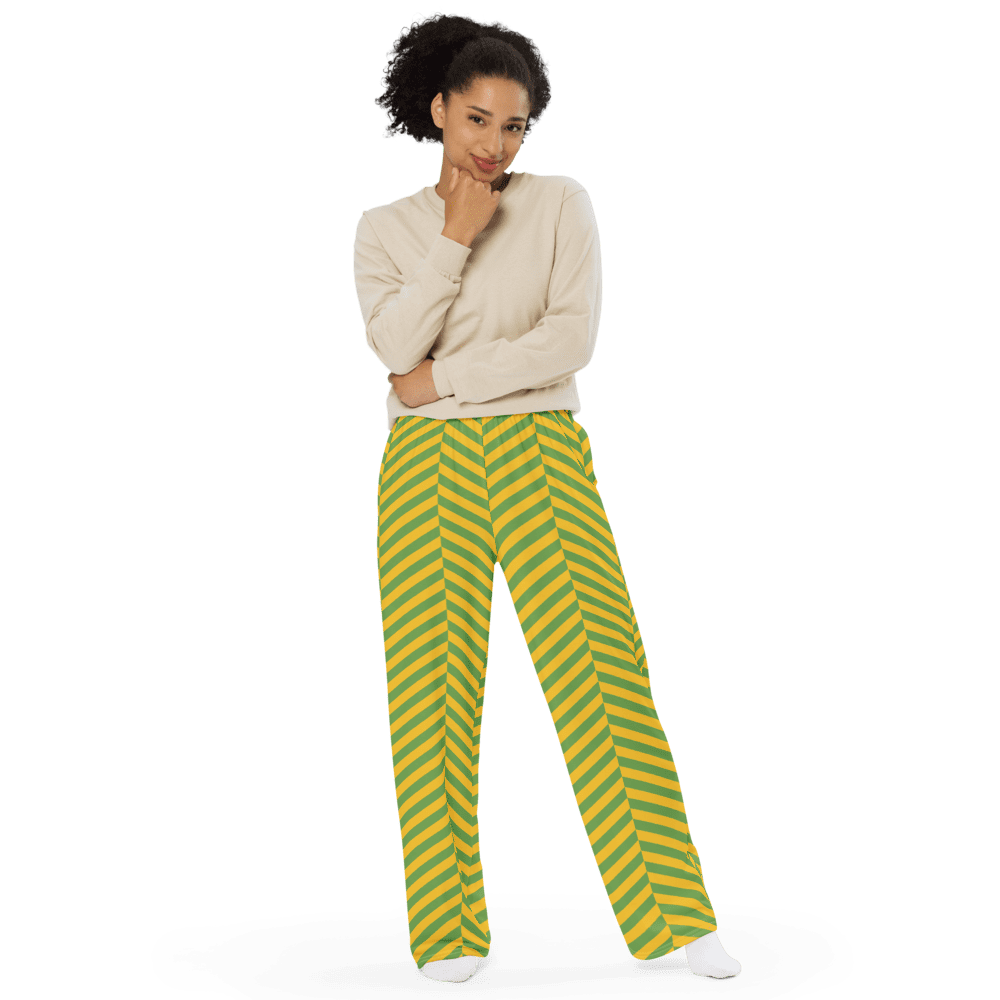 Person in striped pants and beige sweater.