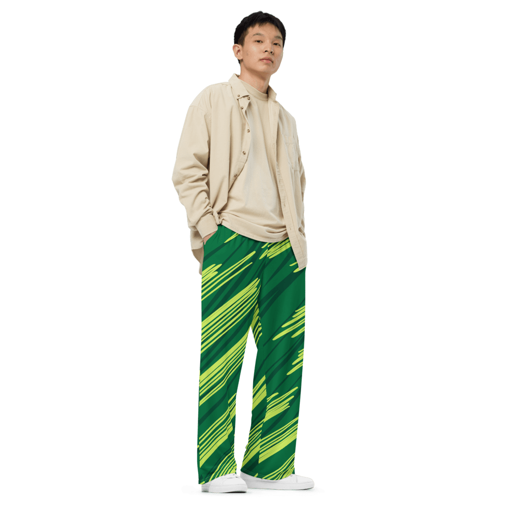 Person in beige shirt and green pants.