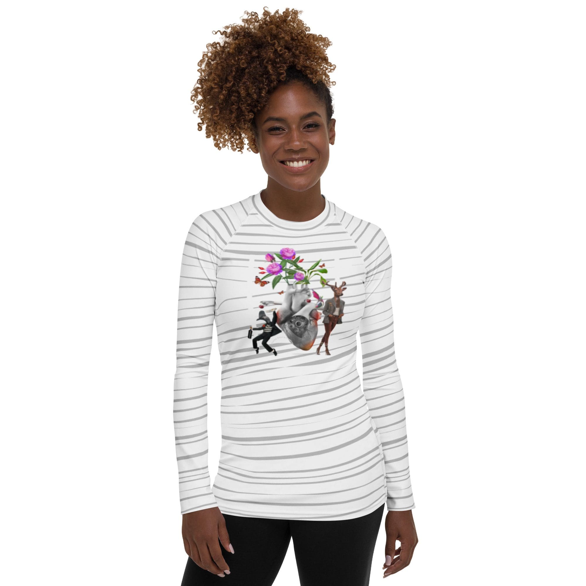 Woman wearing floral graphic striped shirt.