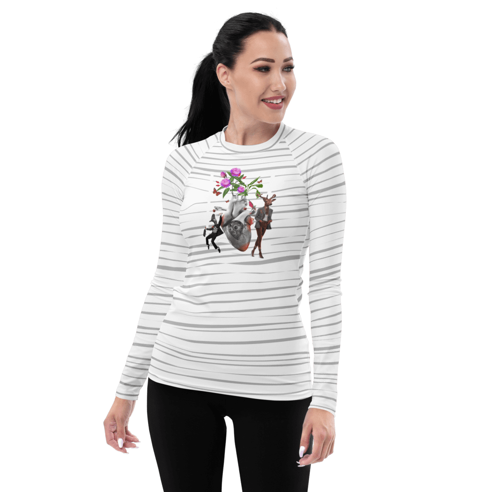 Woman wearing striped shirt with artistic design.
