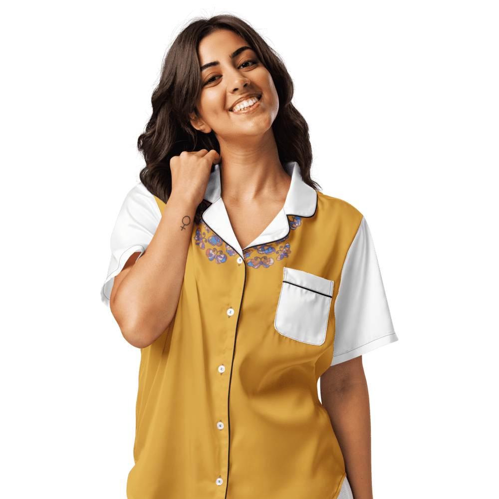 Smiling woman in yellow and white uniform.