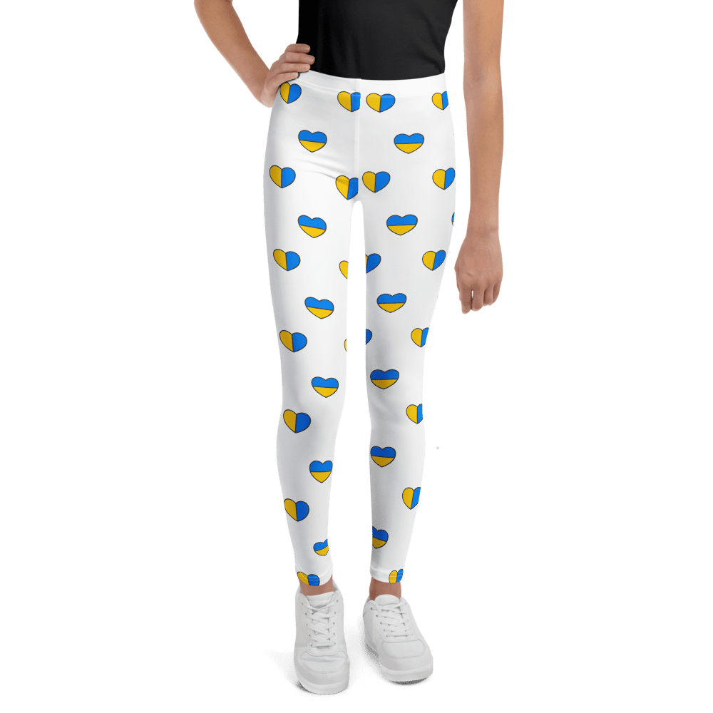 White leggings with blue and yellow hearts.