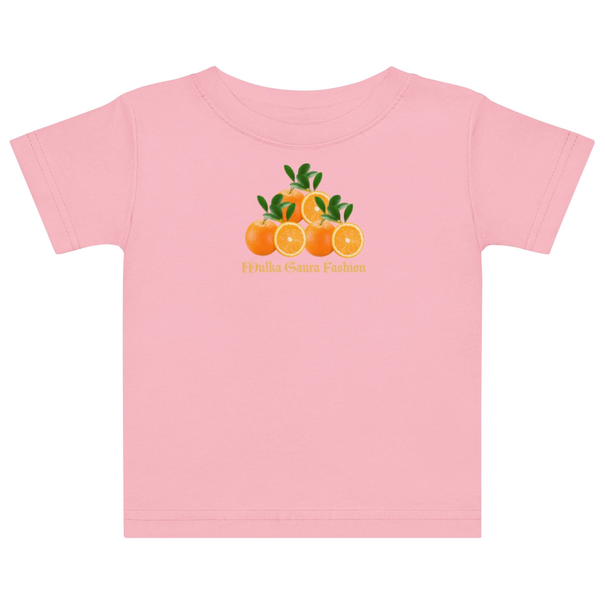 Pink t-shirt with orange fruit design.
