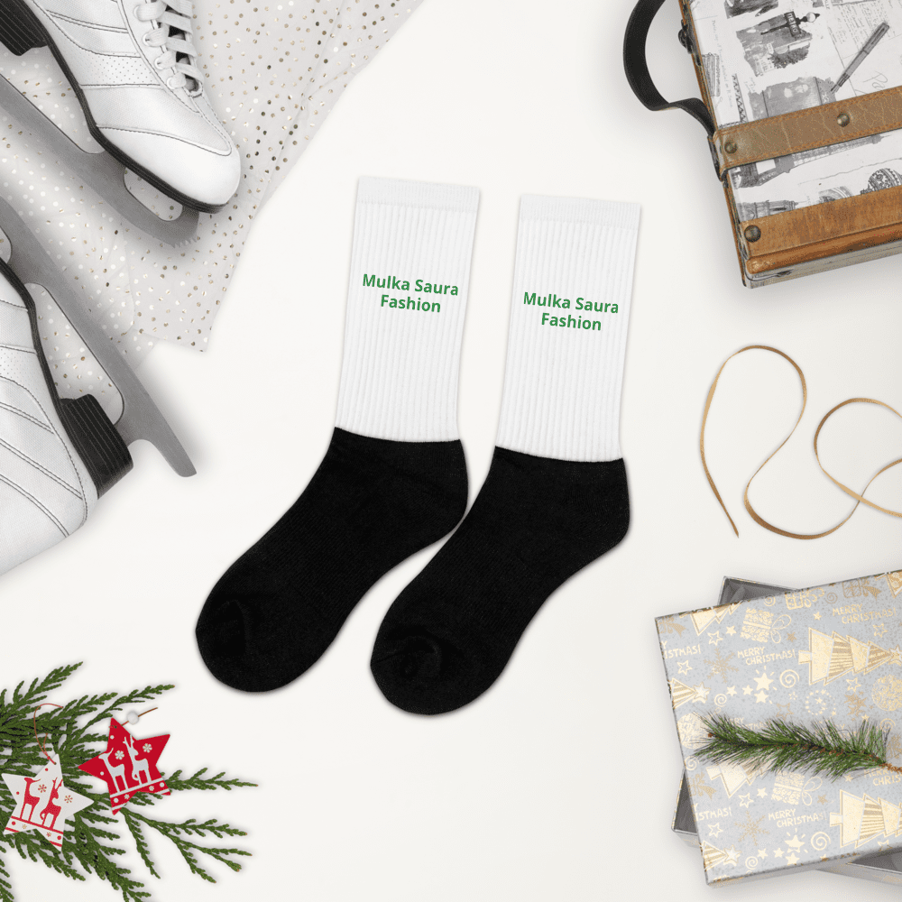 Black and white socks with holiday decor.