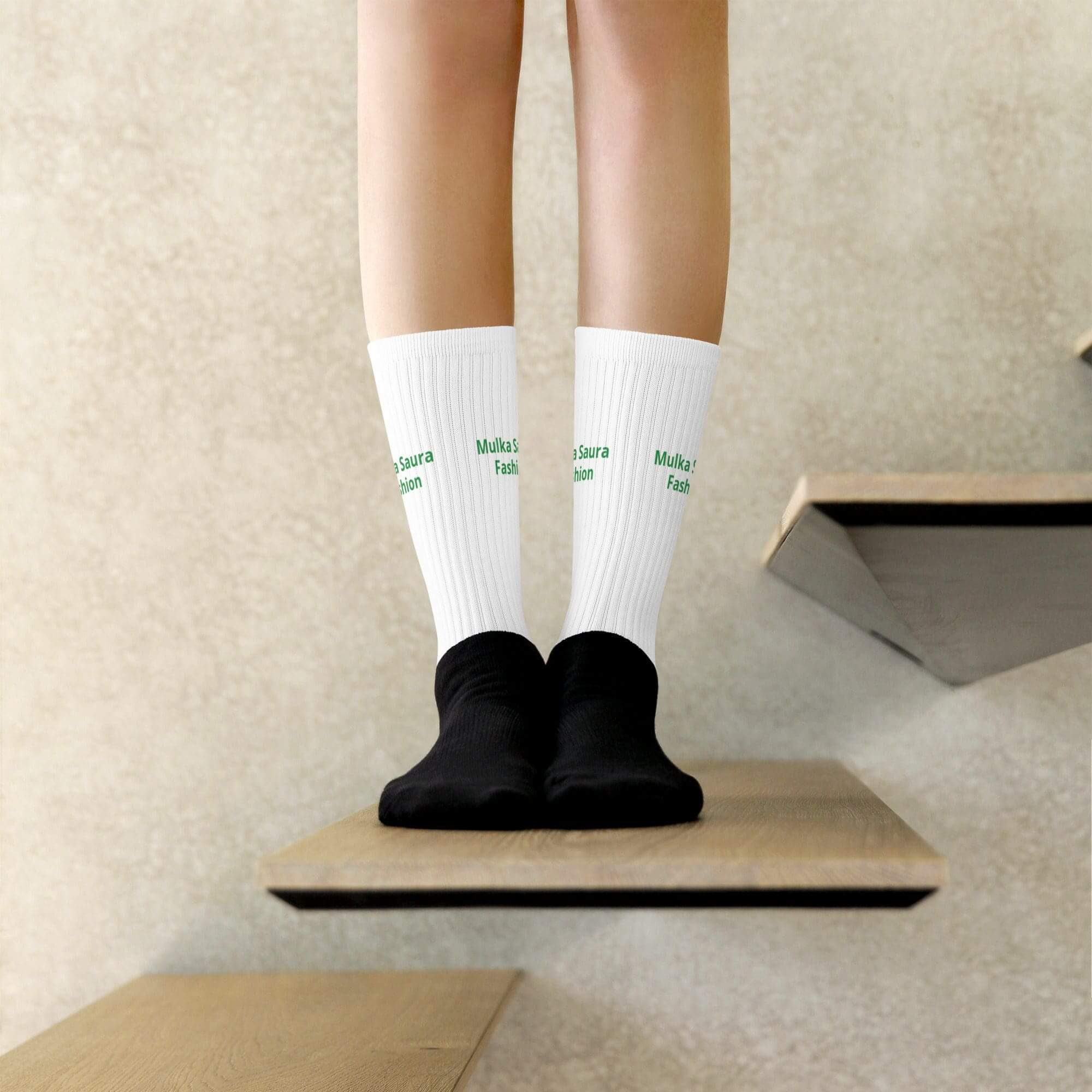 Person wearing white socks on floating steps.
